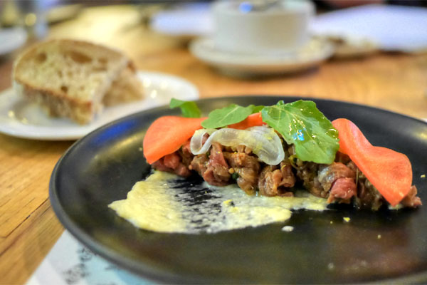 flat iron steak tartare, chive blossom capers and salt cod brandade