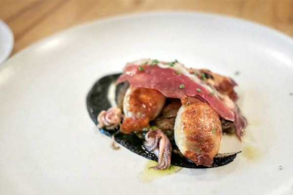 duck sausage-stuffed squid, salsa tinta, duck jamon