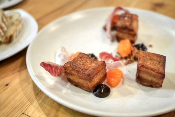 crispy pork belly, dark chocolate, puffed wheat berries, citrus