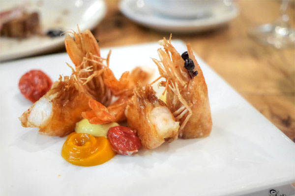 crispy prawns, garlic cream, roasted tomato