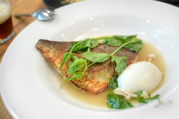 sea bream with jamon broth, slow poached egg, spring peas