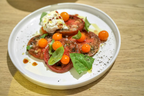 heirloom tomatoes, burrata, basil & saba