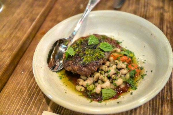 lamb sausage, black eyed peas, sungold, tomato jam, mint