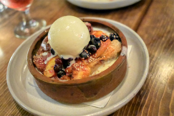 benne & peach bread pudding, blueberries, vanilla bean ice cream