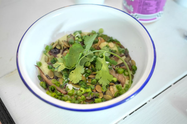 Anson-mills grits, mushrooms, crème fraiche, scallions, pepitas, tomatillo salsa