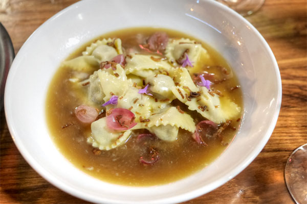 Hillary's Short Rib & Mascarpone Cappelletti, Soubise, Onion Brodo, Pickled Pearl Onions, Crispy Shallots, Chive Blossoms