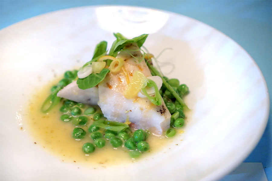 grilled swordfish with peas, chamomile, spring garlic and Meyer lemon