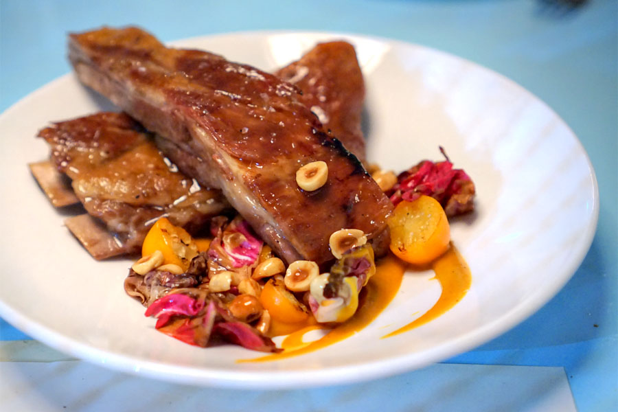 heritage pork ribs glazed in sour ale with pumpkin, hazelnut & kumquat