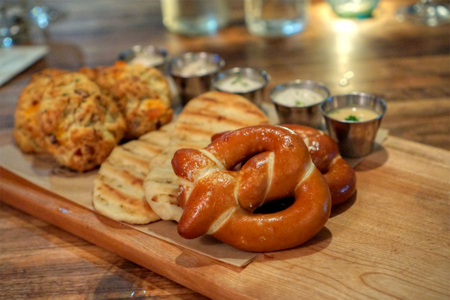 BACON CHEDDAR BUTTERMILK BISCUITS / GRILLED NAAN FLATBREAD / FLEUR DE SEL PRETZEL