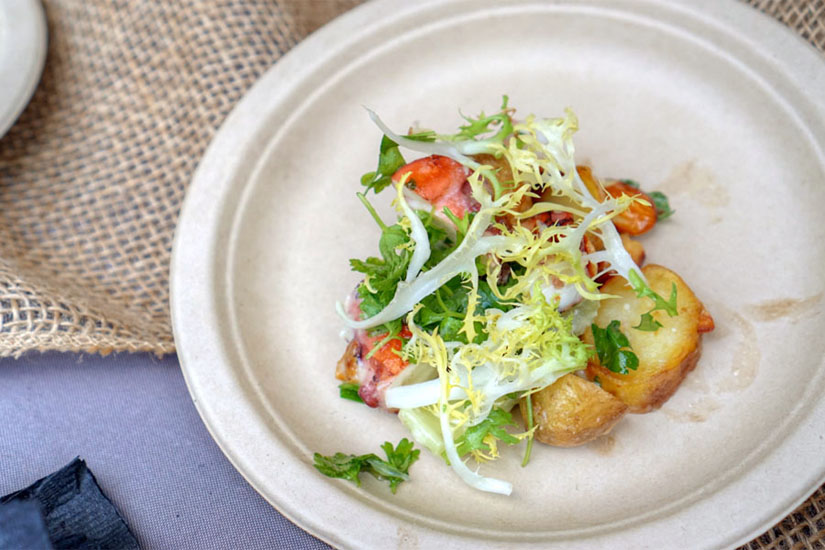 Charred Spanish octopus, warm marble potato, celery heart, toasted almonds, frisée, caesar dressing