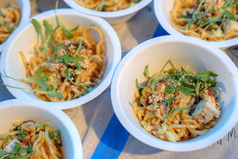 Chilled spicy mussel ramen, togarashi shellfish broth, fresh herbs & coriander flowers