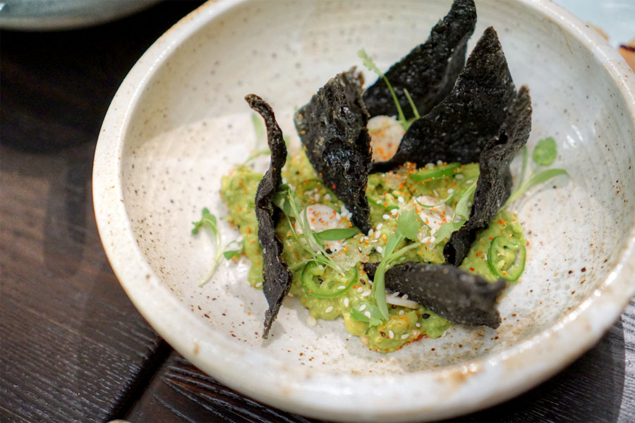 Seaweed 'dorito' with guacamole, togarashi and hearts of palm