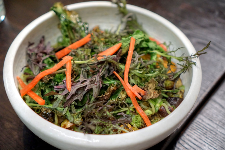 Green onion spaghetti with wood ear mushroom, brassicas and yeast broth