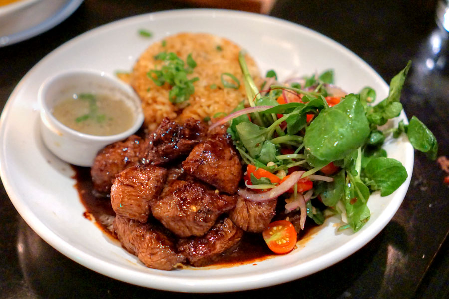 shaky shaky beef, watercress, baby tomatoes, burnt butter soy with tomato garlic fried rice