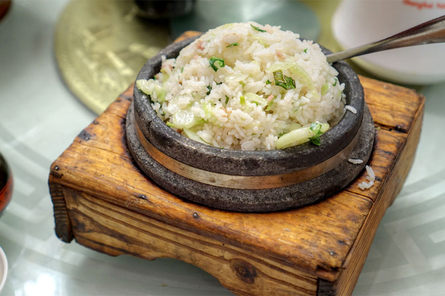 Rice Mixed with Salted Meat in Casserole