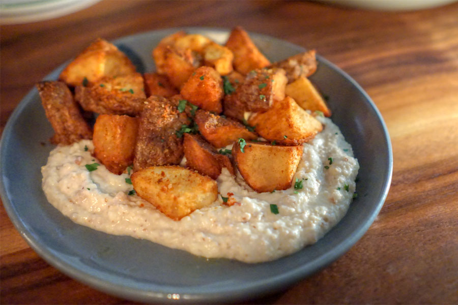 Patatas bravas, crispy russet potato, paprika, skordalia