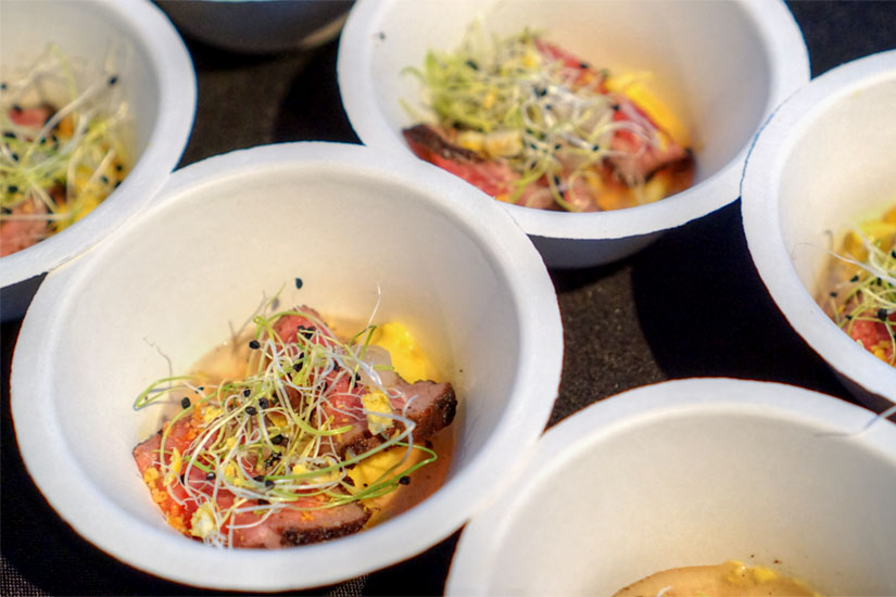 Dry Aged New York Tataki with Dashi, Pickled Ramps, Marrow, and Beef Fat Creamed Corn