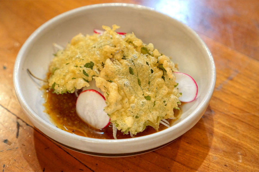 Kurodai crudo, local black bass, daikon-garlic sauce, French breakfast radish, tempura shiso