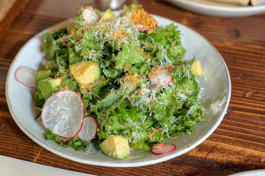 Siberian kale, avocado, radish, sheep's cheese, lemon, anchovy bread crumbs