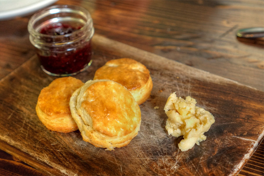 Cream biscuits, honey butter, mixed berry jam