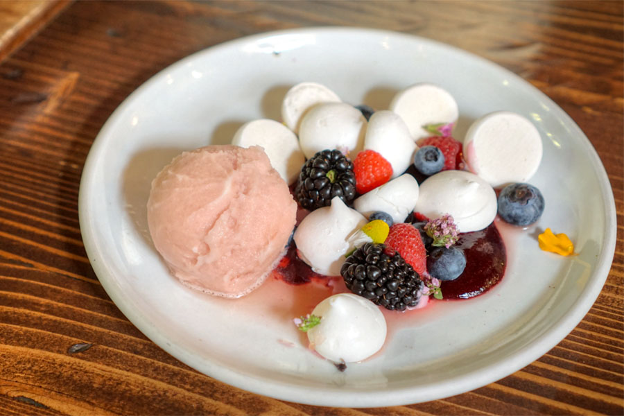 Meringue, verjus rouge sorbet, berries, yogurt