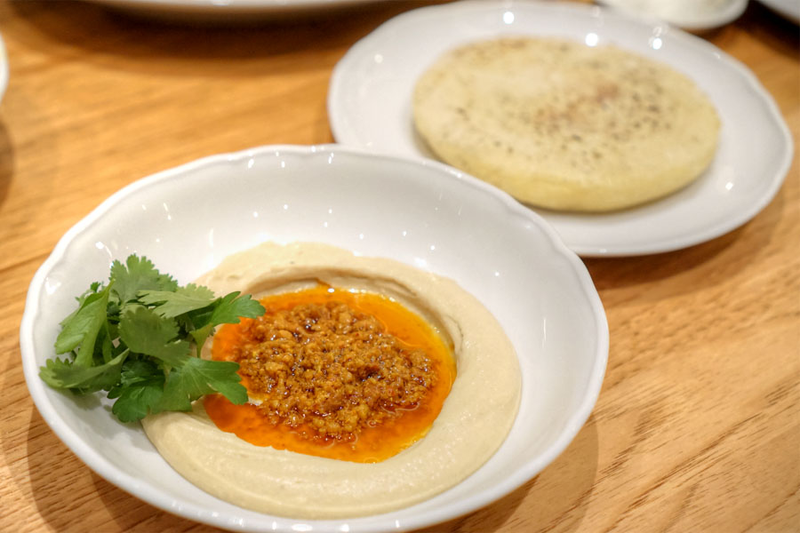 Duck 'nduja hummus, creamy garbanzo beans, Jerusalem mix spice, herbs, pita