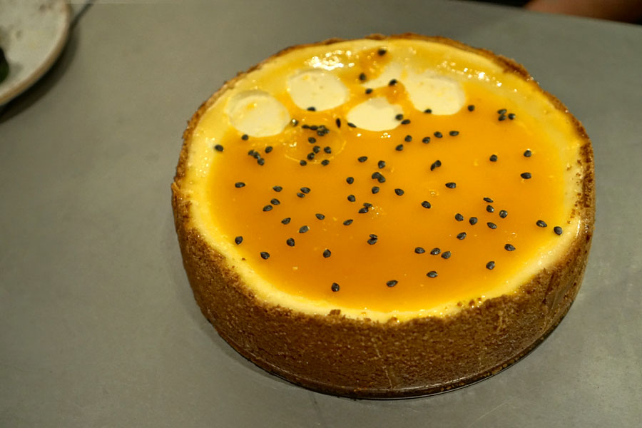 coconut cheesecake with passion fruit - whole
