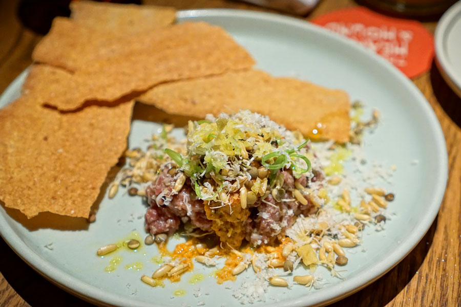 Beef Tartare with Harissa + Sprouted Lentils