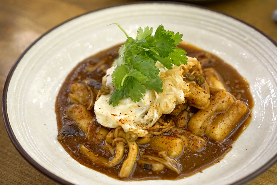 Wild mushrooms, rice cakes, wok egg, soy, cilantro, thai chili