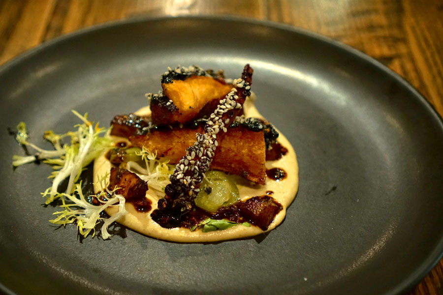 Pulpo laminado, crispy octopus, mole blanco, ink pepper jam, sunchoke