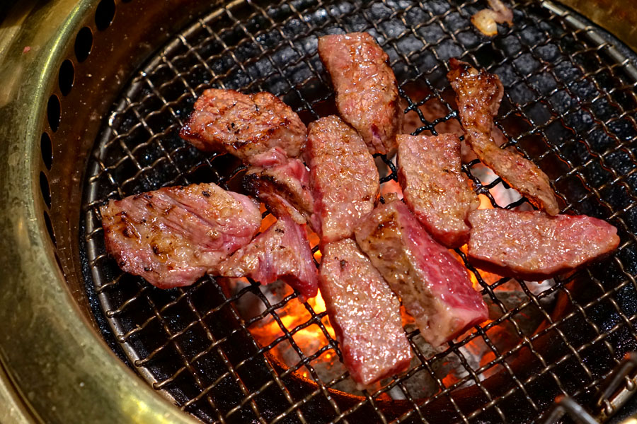 Seasoned prime boneless short rib (being cooked)