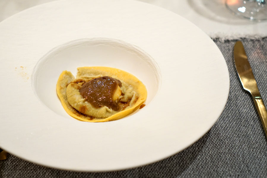 Raviolo, Eggplant Purée, Dandan Sauce, Black Vinegar Reduction