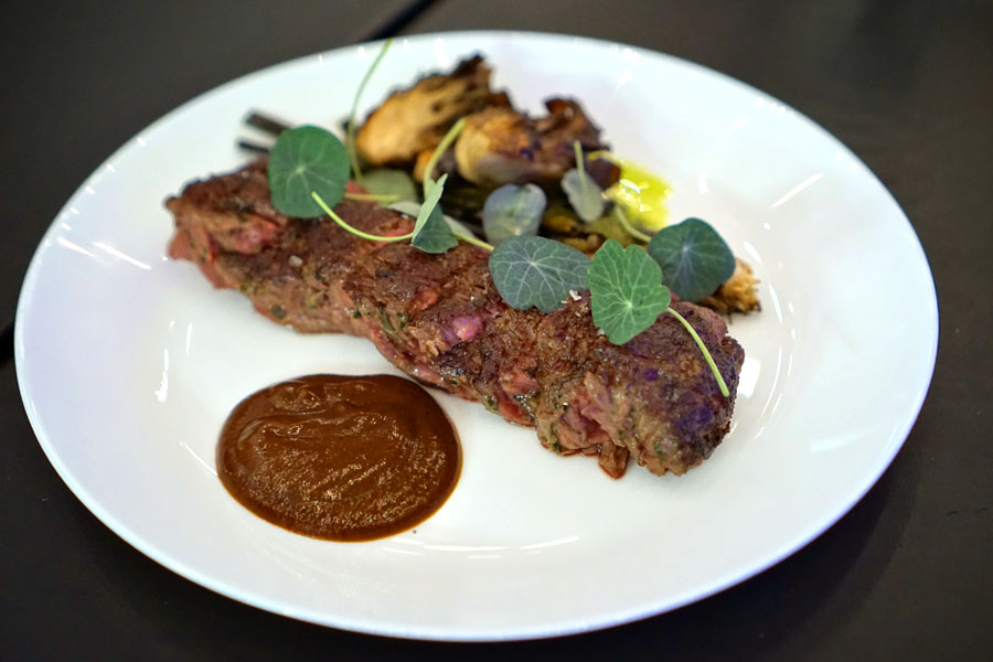 hanger steak, sautéed scallions, maitake mushrooms, steak sauce, nasturtium pesto