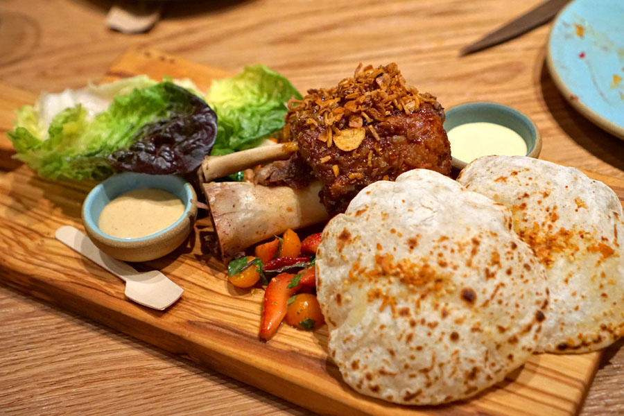 Sticky glazed pork shank, shiitake, strawberry, hoisin mayo, hot mustard, naan, lettuce cups