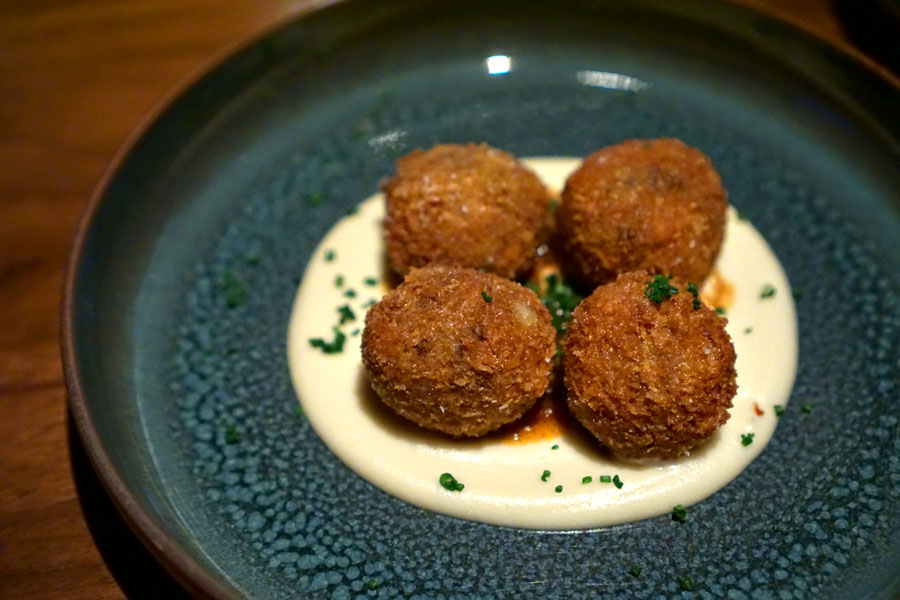 Braised Beef Croquetas served over celeriac puree