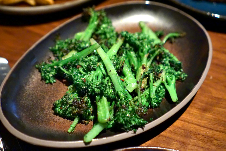 Broccolini with garlic and red pepper flakes cooked over the wood fire