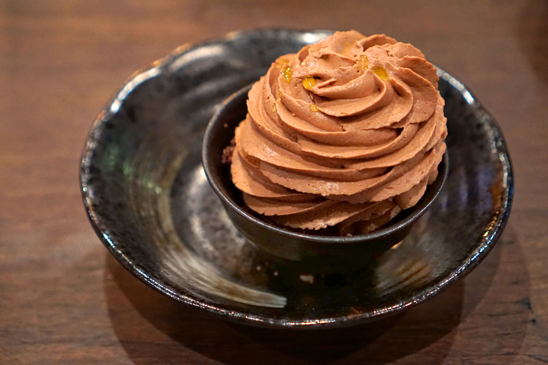 Chocolate mousse, vietnamese coffee, candied orange, feuilletine.