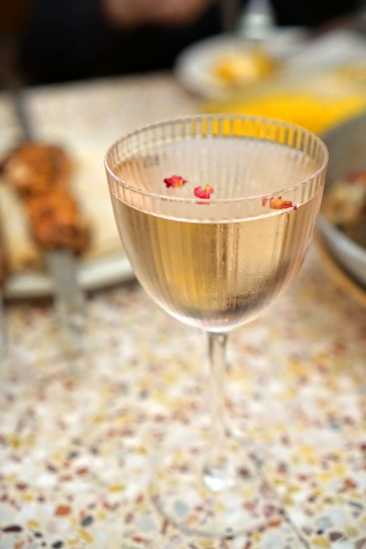 Vesper, gin & vodka, rose, raspberry, lemon oil