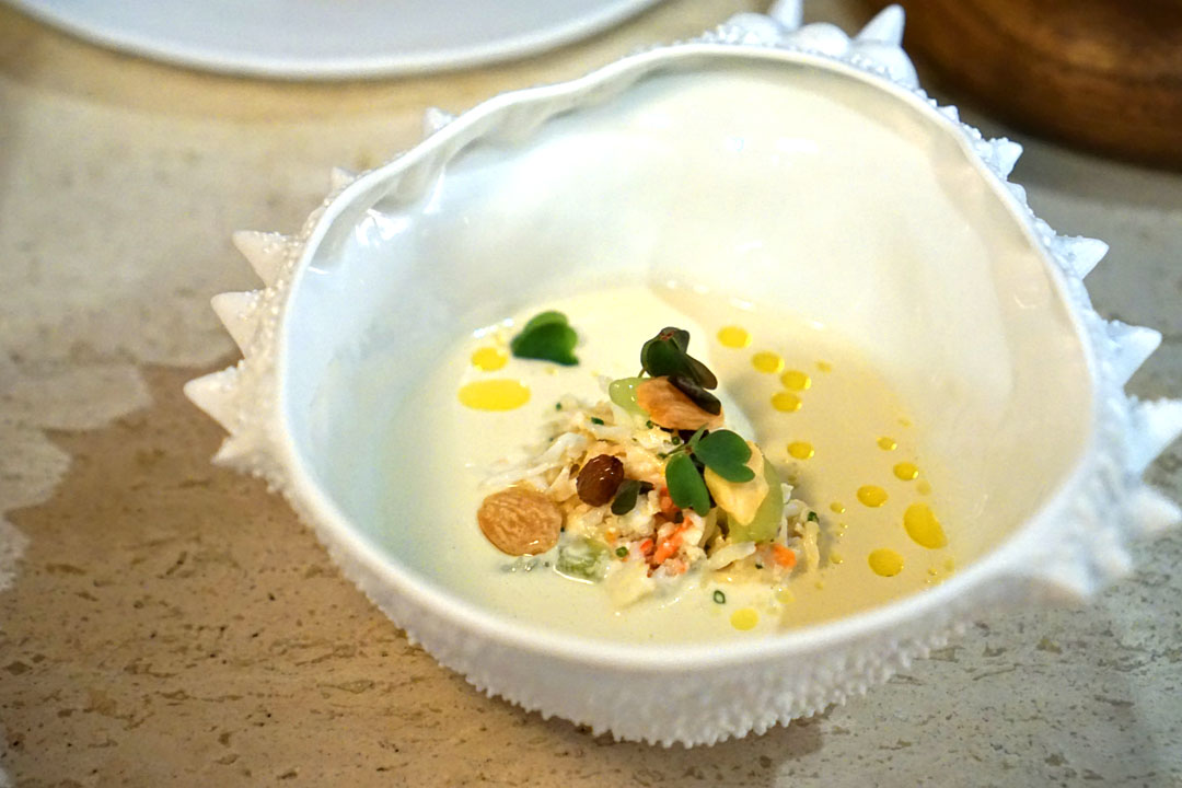 Ajo blanco, chilled soup of almonds and garlic, grapes, king crab, pink sorrel
