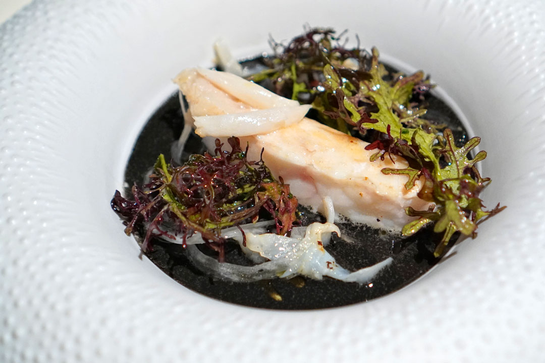 Turbot with mustard greens and onion