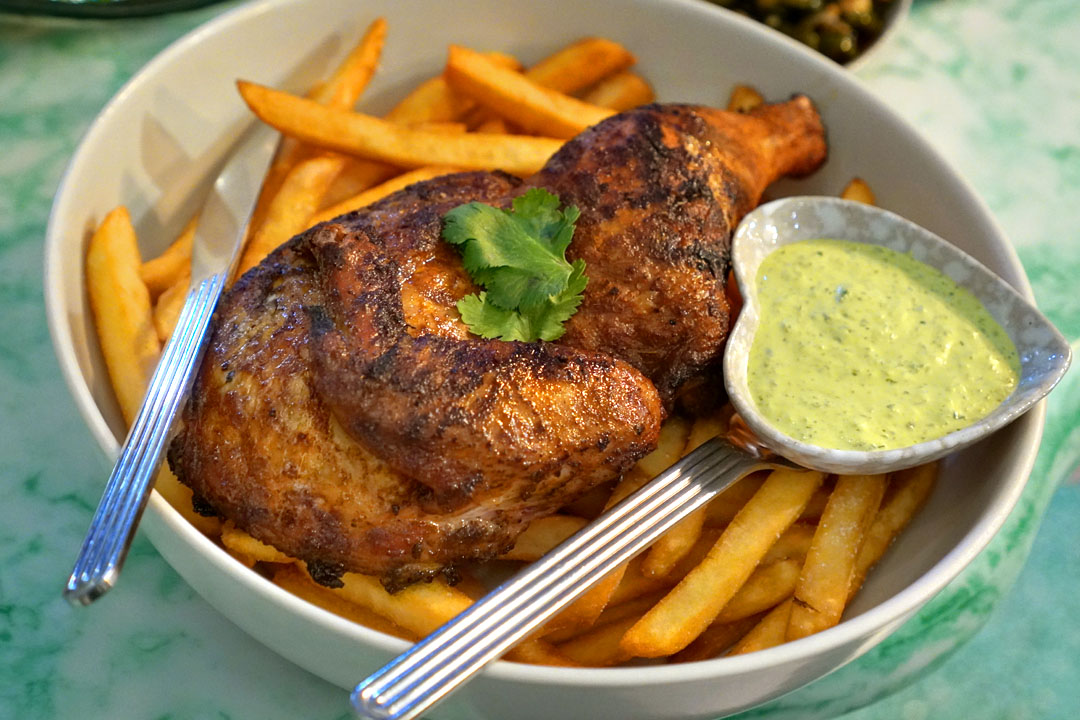 Pollo ala brasa, 1/2 chicken in 24 hr dry brine cooked over wood fire served with fries and aji sauce