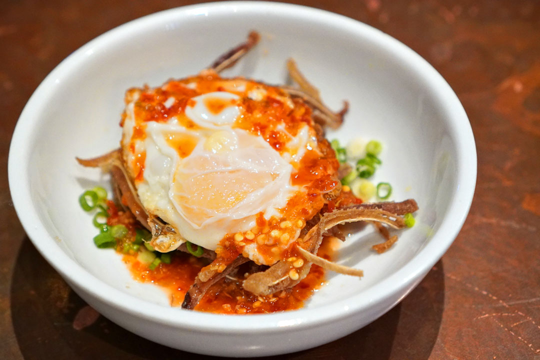 crispy pig ear, red chili, lime, market egg