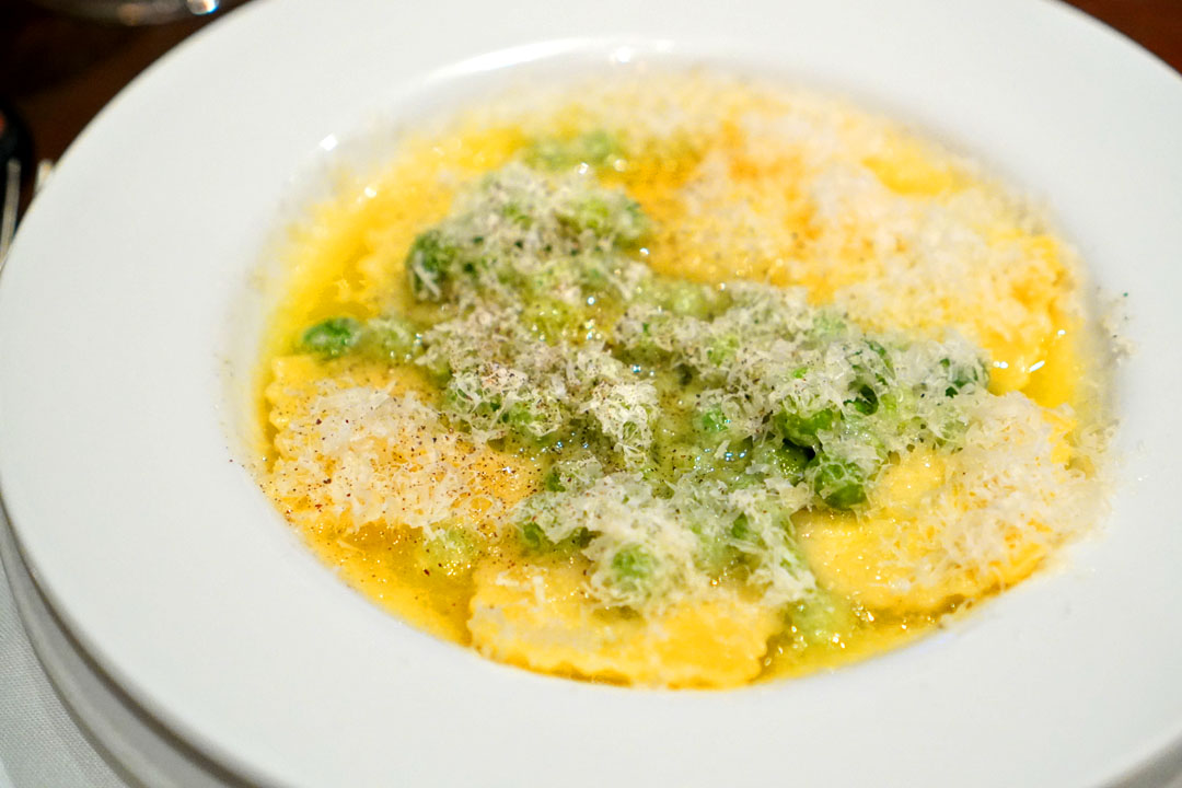 spinach & ricotta ravioli, butter, parmesan, peas