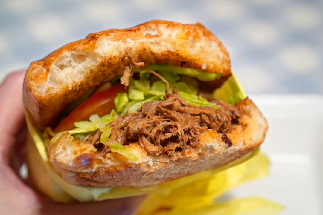 Torta - Beef Birria (Bitten Into)