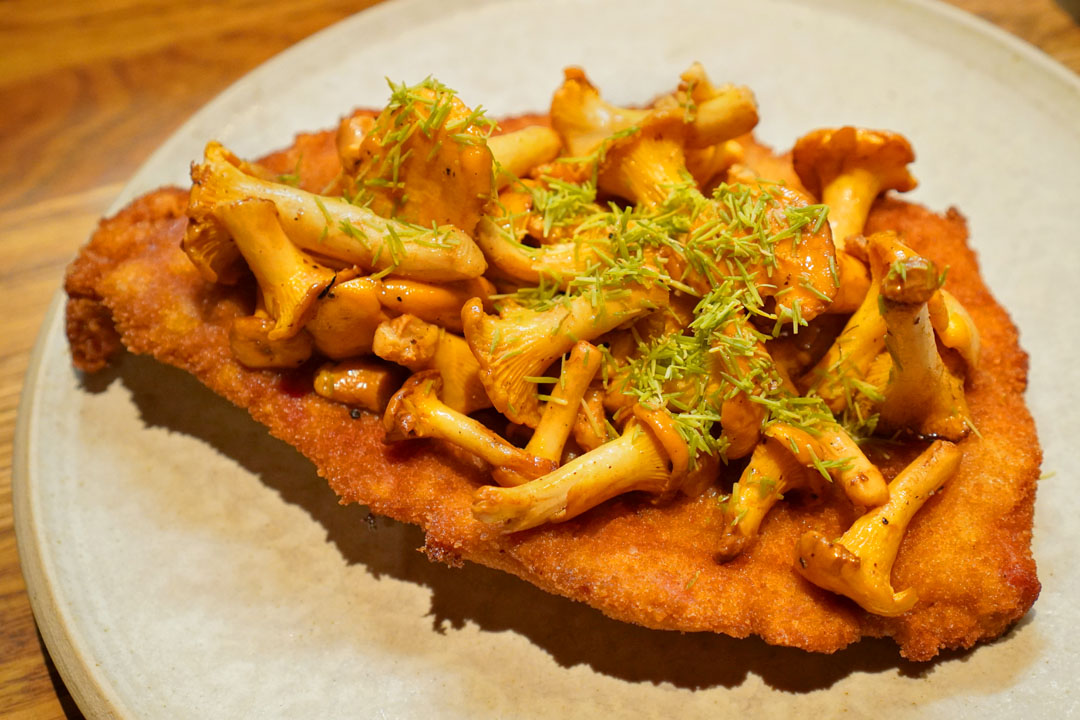 Schnitzel Wiener art, free-range pork, with chanterelle, lingonberries and Barr's butter sauce