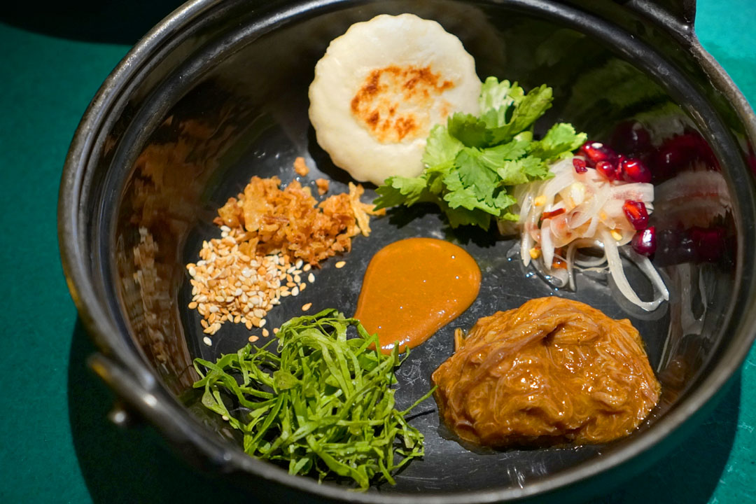 肉夹馍 Shaanxi pulled lamb 'burger' with Xinjiang pomegranate salad
