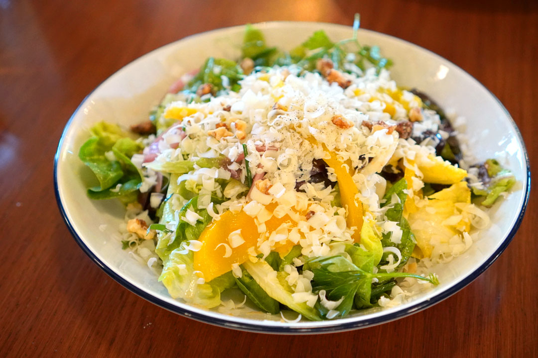 Market lettuces, mango, comté, walnuts, calamansi vinaigrette