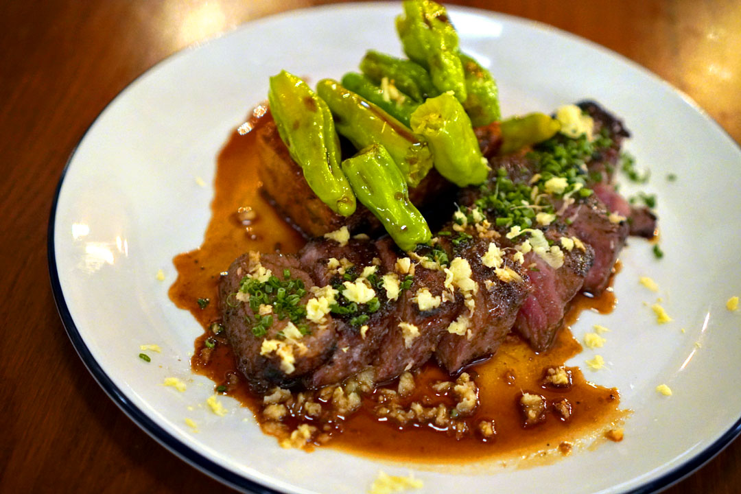 Flannery New York steak, hash browns, ginger brandy sauce, arugula salad, fresh ginger (8 oz)