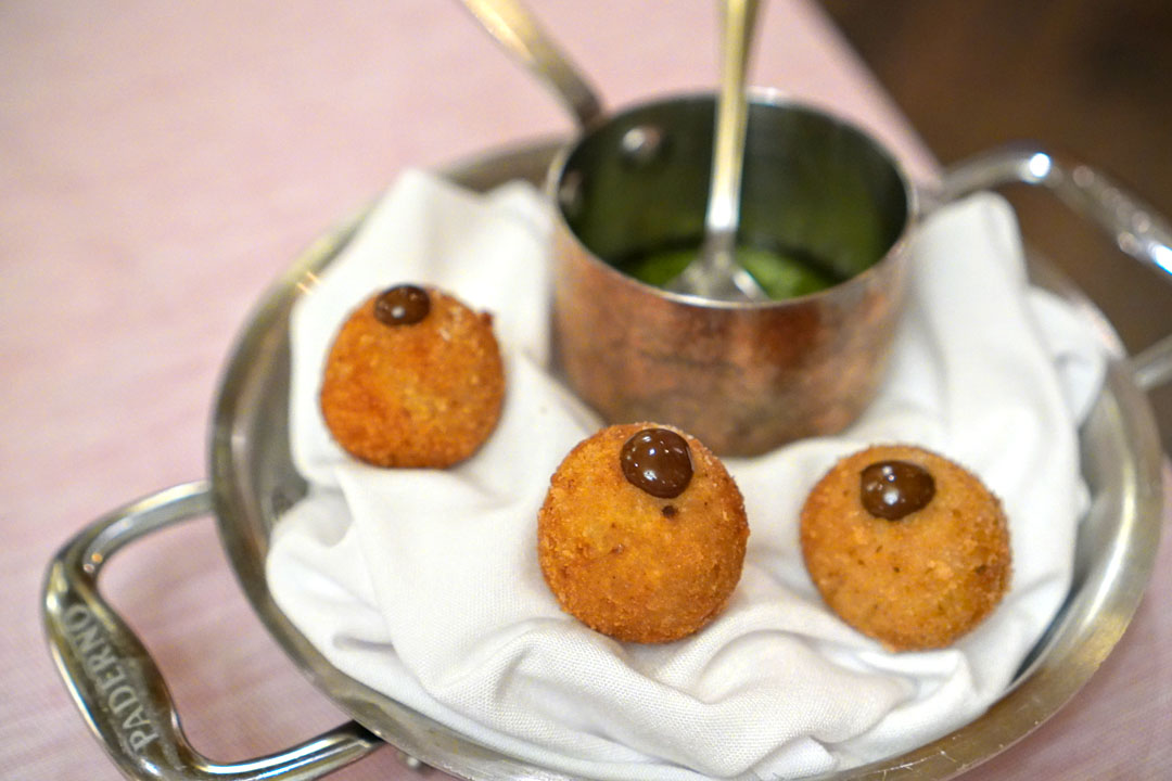 Veal bonbons with sauce verte